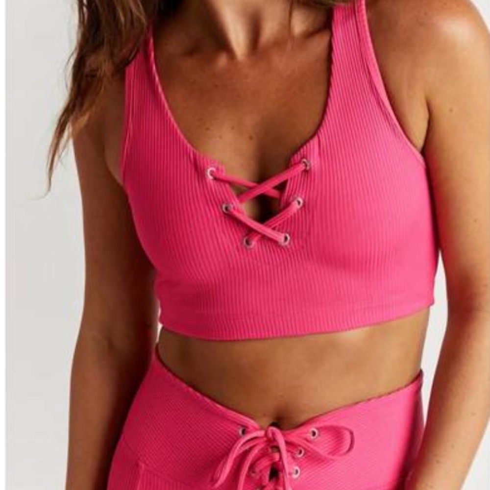 NWT - YEAR OF OURS ribbed football bra in magenta - Size XS